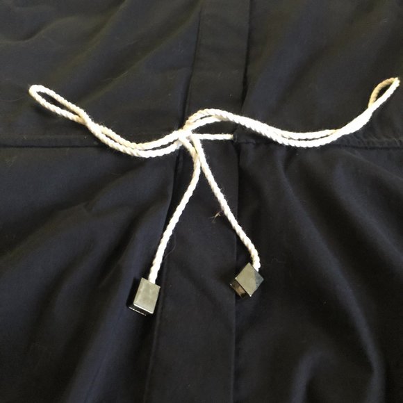 Navy top with white tie - Picture 6 of 7